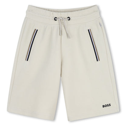 Beige shorts with zippers and &