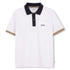 White polo shirt with navy collar and brown accents on a white background